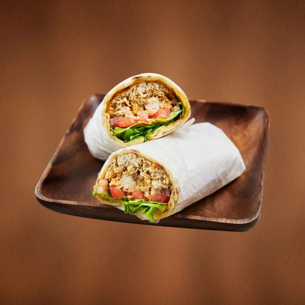 Char-Grill Wrap - charcoal chicken strips with lettuce, tomato, red onion and mild Portuguese sauce in a toasted tortilla