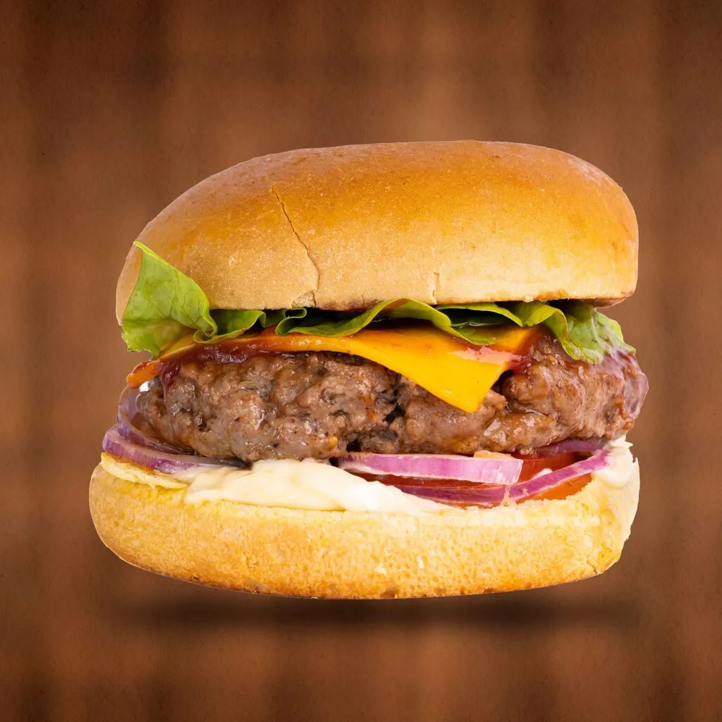Beef Burger - marinated beef patty on a toasted bun with tomato, onion and lettuce